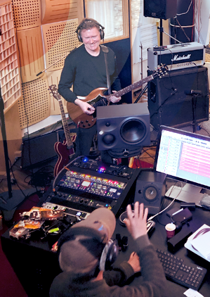 Martin in the Recorderhead studio smiling and talking to Stephen